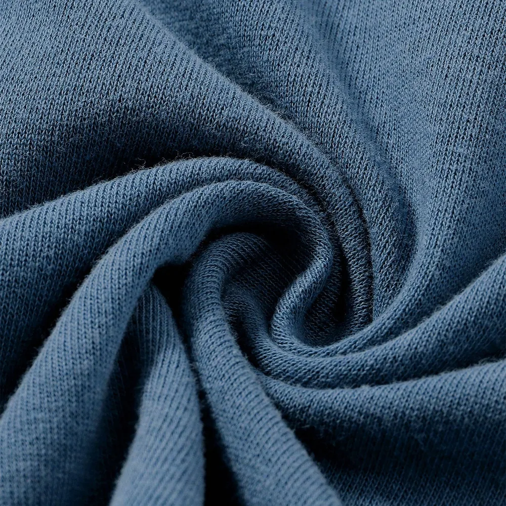 Close-up of knitted cotton jersey showing the fabric hand and surface