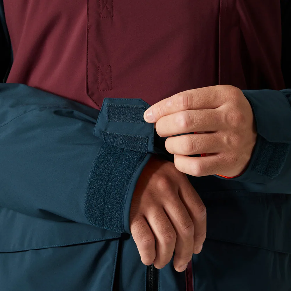 Adjustable hook-and-loop cuff on a ski jacket